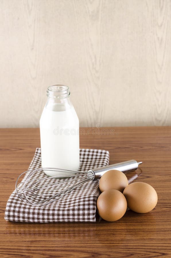 Whisk egg and milk stock photo. Image of eggs, preserves 40687096
