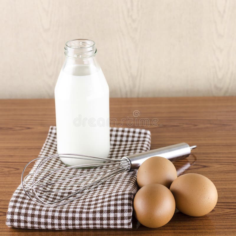 Whisk egg and milk stock image. Image of preserves, bowl 40709413