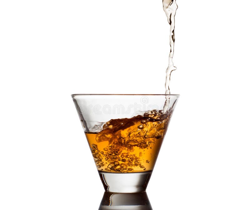 Whiskey Being Poured into a Glass Stock Photo Image of black, amber