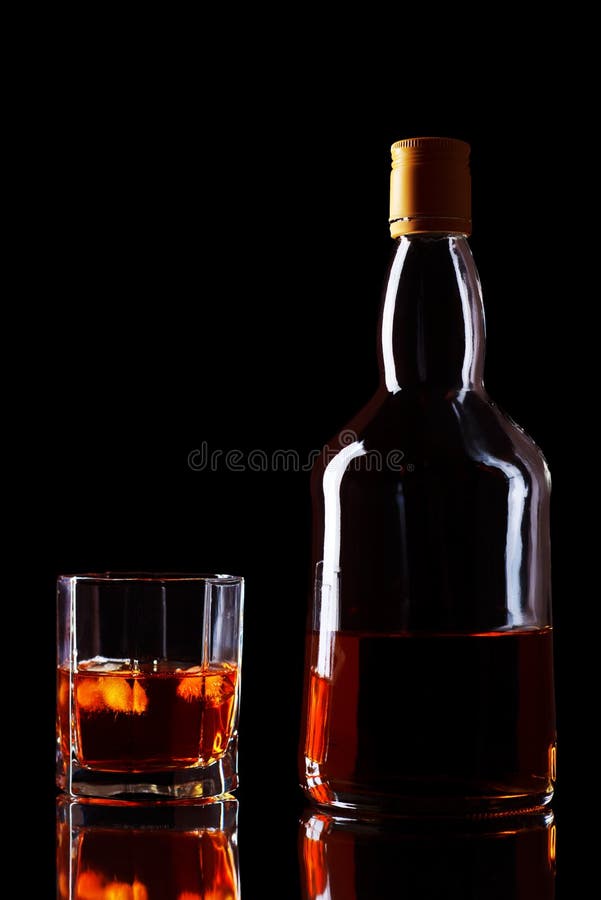 Whiskey Bottle and Glass stock photo. Image of bottle 18693554