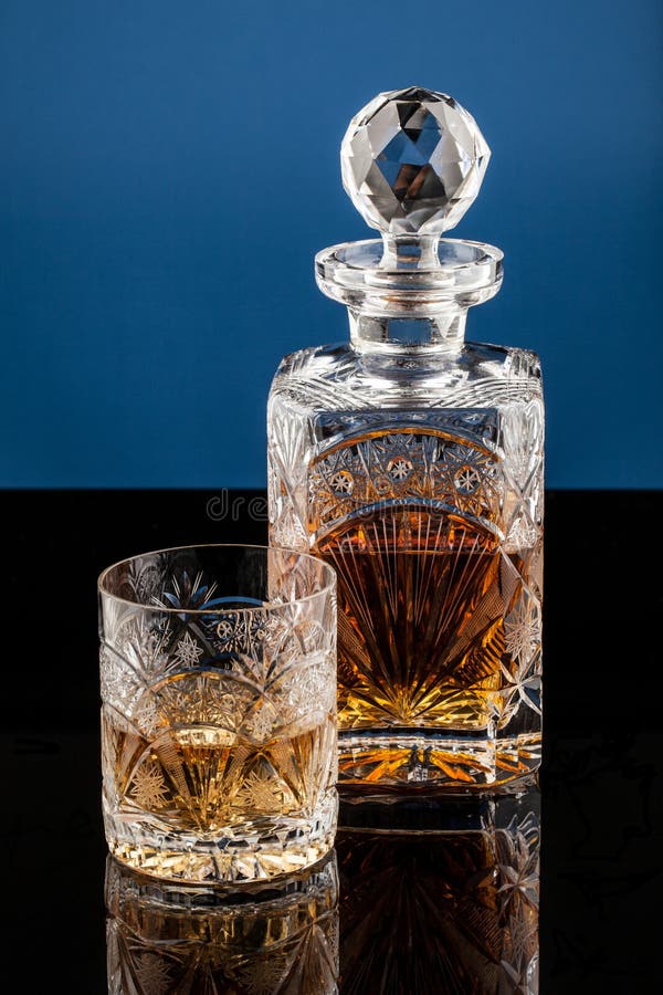 Whiskey Glass & Bottle stock image. Image of hard 26397601