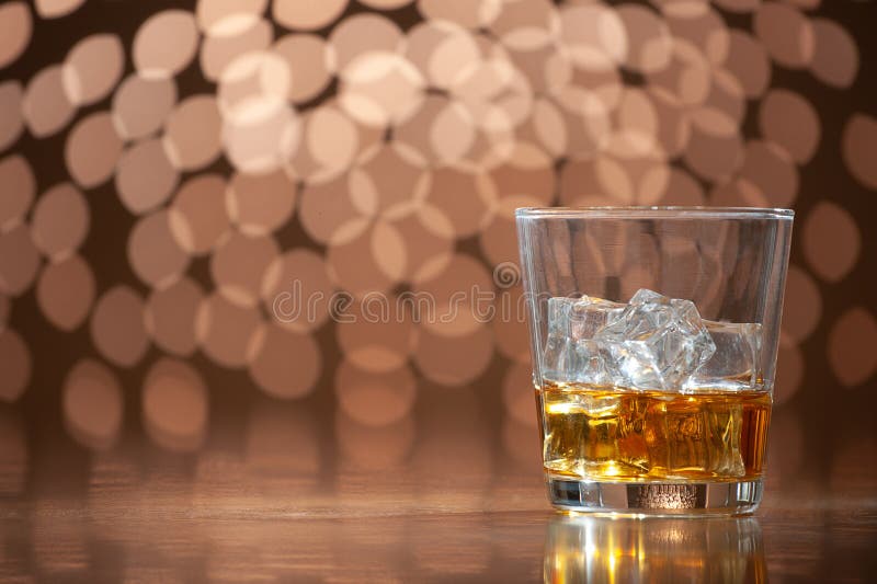 Whiskey on the rocks on bokeh back ground. Bokeh whiskey stock images, royalty-free photos and pictures