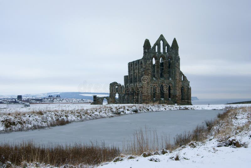 The ruins of the medieval Whitby Abbey ,North Yorkshire ,in the snow