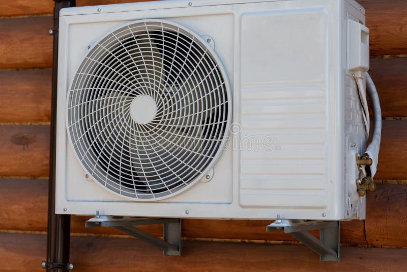 White Air Conditioner Hanging on the Wall Stock Photo Image of