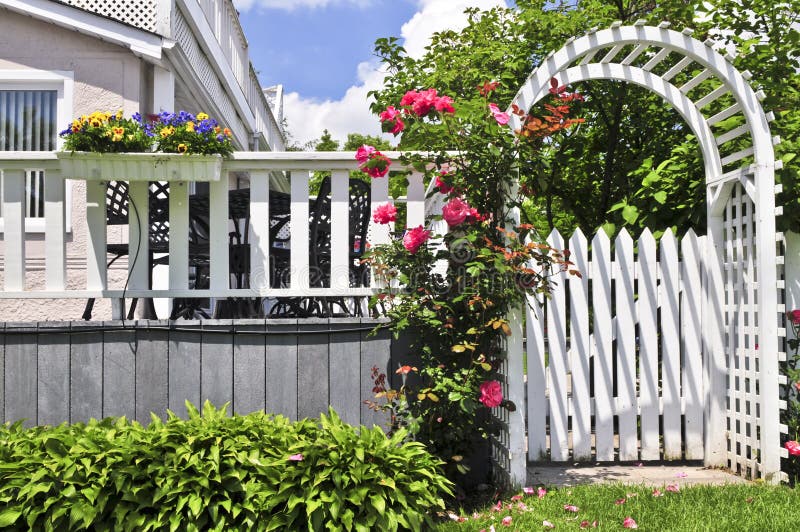 White arbor in a garden royalty free stock images White arbor in a garden royalty free stock images