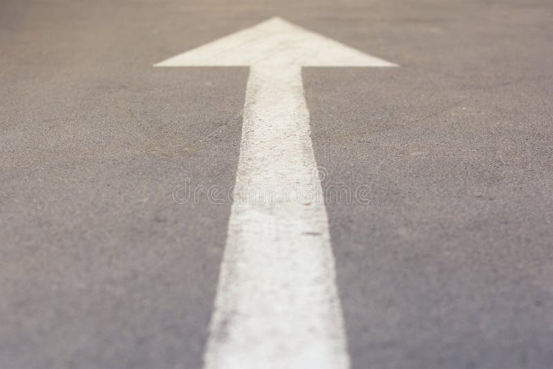 White arrow direction on the road, forward stock photos