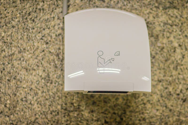 White Automatic Hand Dryer in Public Toilet Stock Image Image of