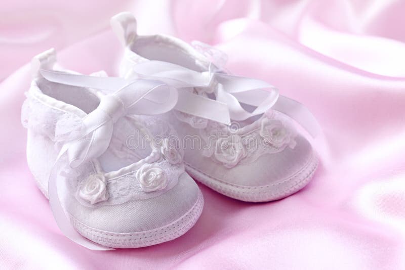 White baby booties stock photo. Image of christening 16983144