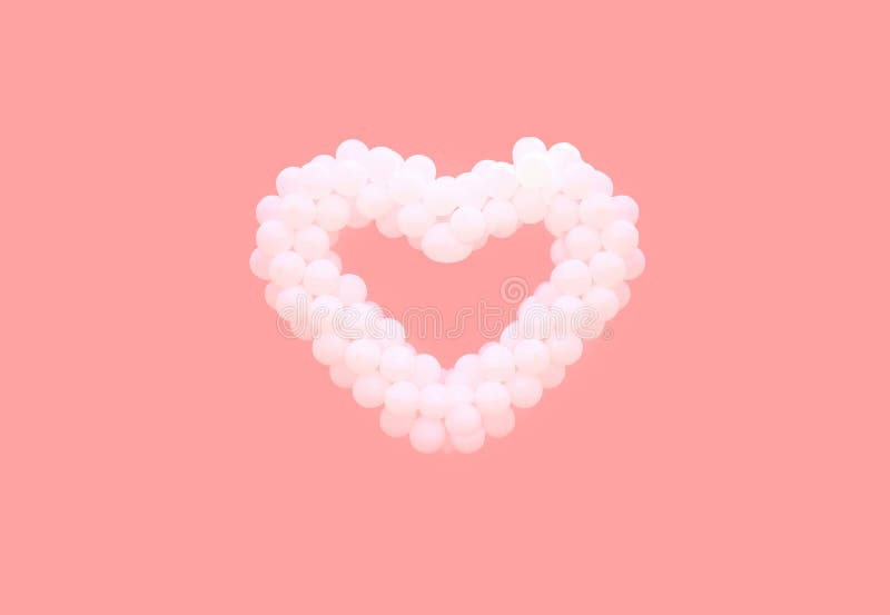 White balloons in shape of heart isolated on pink background. Love, valentine`s day, relationships concept, empty copy space