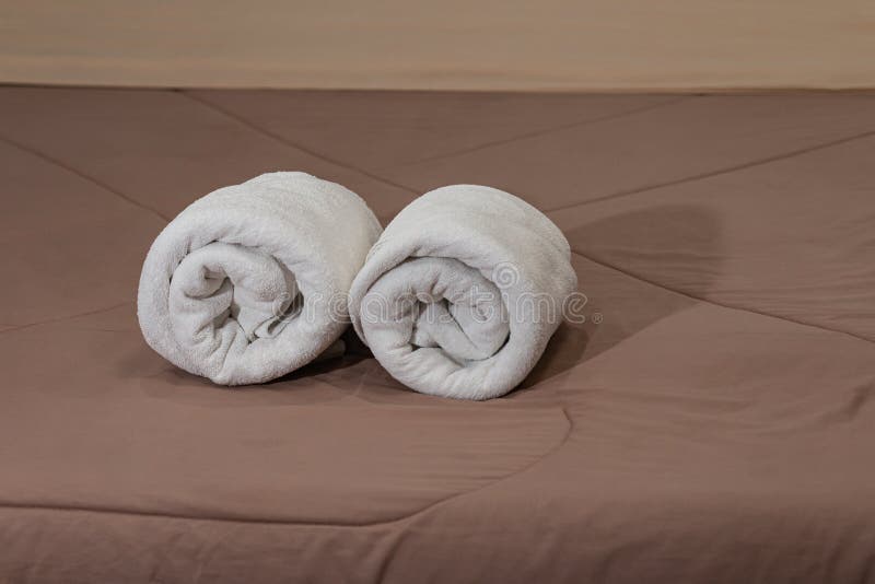 White Bath Towels Roll on a Bed in the Hotel Suite Stock Photo Image of light, beautiful