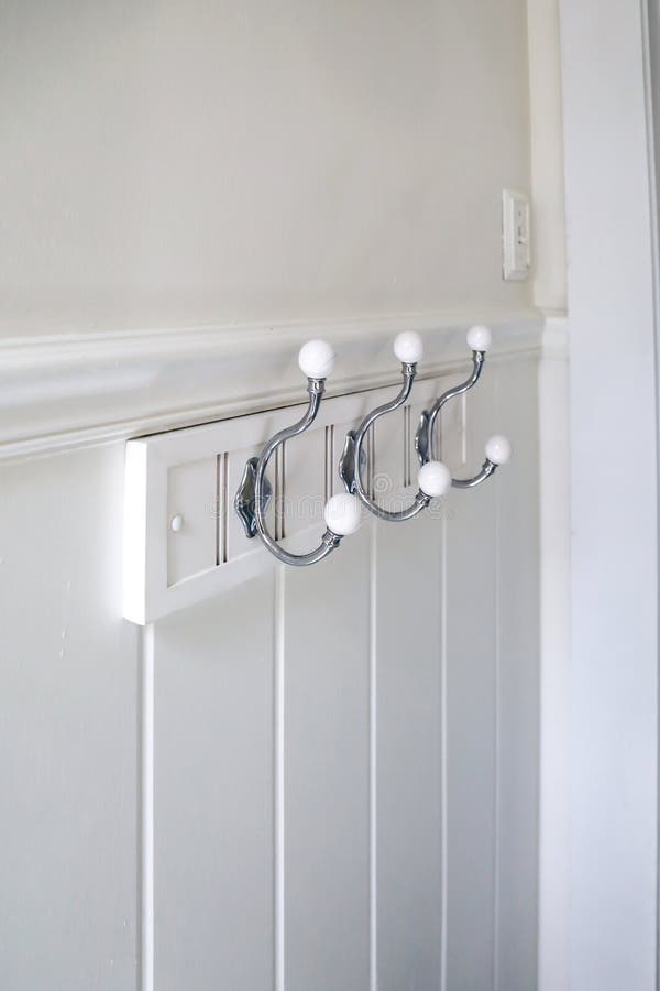 A White Bathroom Wall with Towel Hooks Stock Photo Image of steel