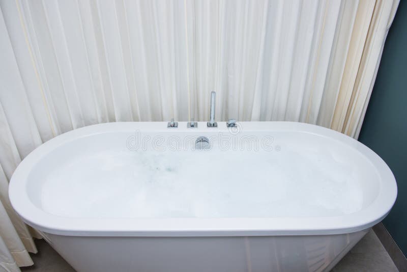 White Bathtub with Foam Bath Stock Image Image of washing, hygiene