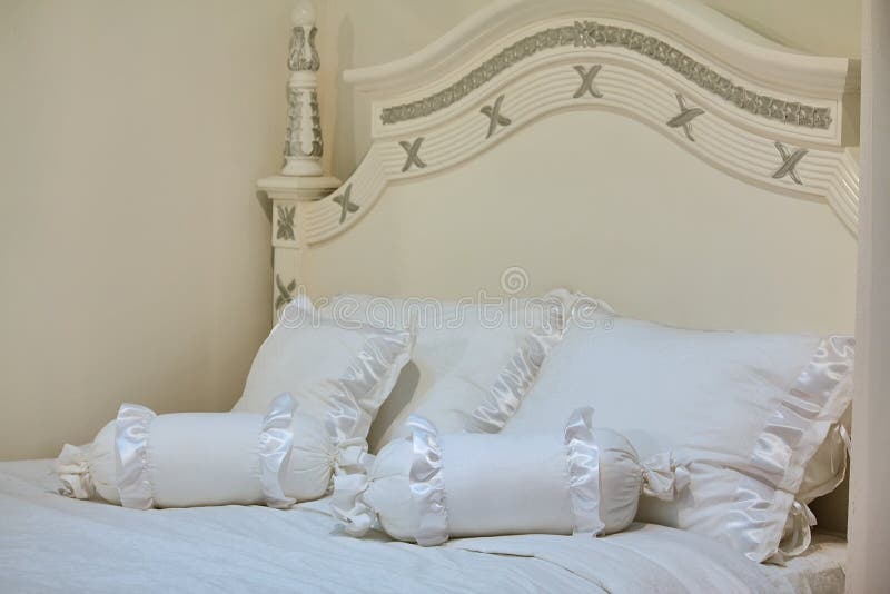 White Lumbar Pillow on a Bed, Case Mockup. Interior Photo Stock Image