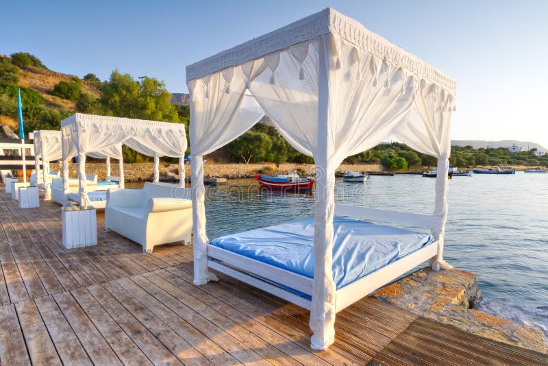 Beds and Sunloungers in a Beach Club in Spain Stock Photo