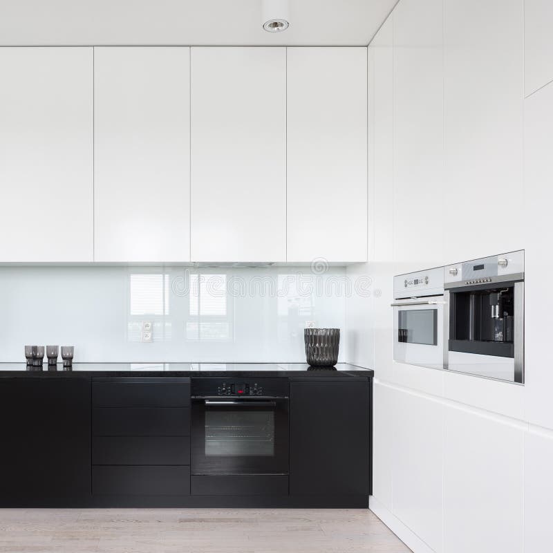 White and Black Kitchen Cupboards Stock Photo Image of flat, lacobel