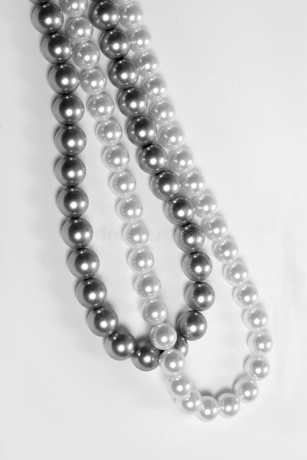 White and black pearls