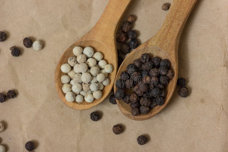 White and black peppercorn stock image. Image of condiment 83229113