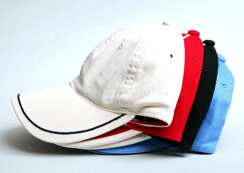 White , Black , Red and Blue Baseball Cap on a White Background Stock