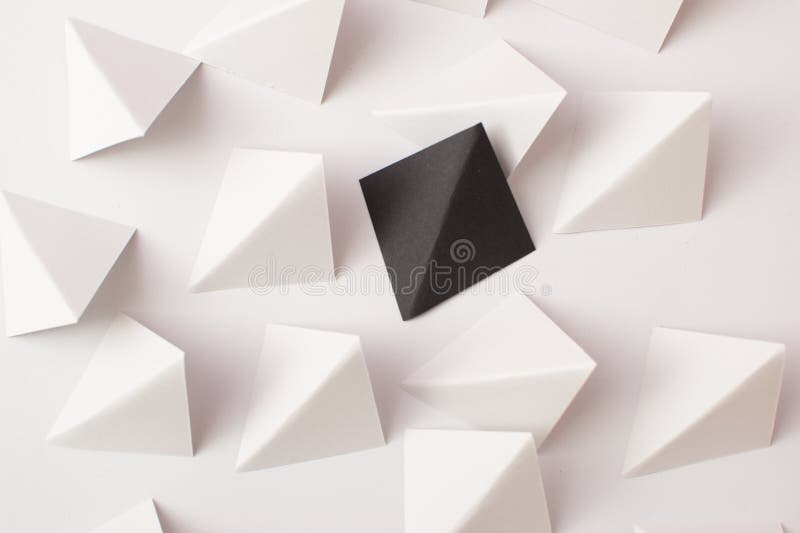 White and Black Triangle Shapes on White Background. Think Out of the