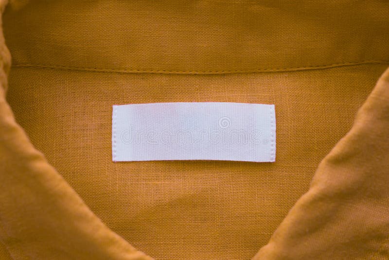 White Blank Clothing Tag Label on Brown Linen Shirt Fabric Texture ...