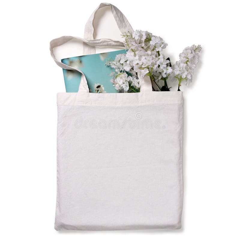 White blank cotton eco tote bag with flowers and notebook, design mockup. White blank cotton eco tote bag with flowers and notebook, design mockup.