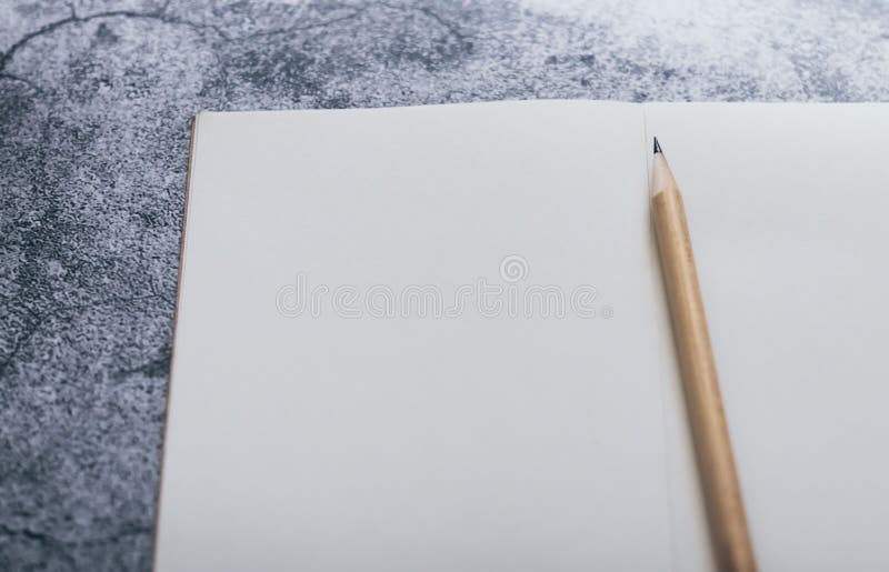 Download Caption: Blank Journal with Pencil Ready for Idea Generation  Wallpaper