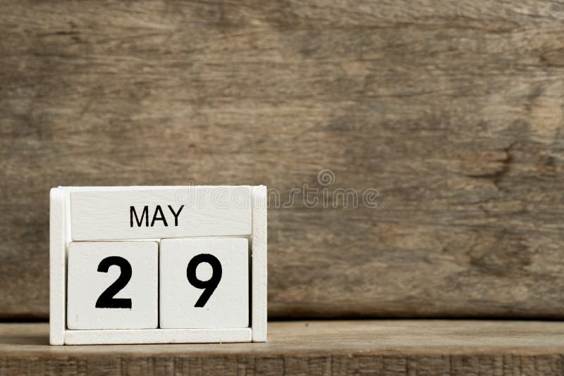 White block calendar present date 29 and month May on wood background royalty free stock images White block calendar present date 29 and month May on wood background royalty free stock images