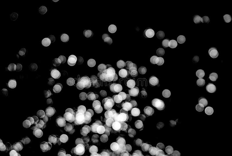 White Bokeh on a Black Background Closeup, Bright Glare of Light Texture,  Light Lights, Black and White Photo Stock Image - Image of dark, natural:  175215191