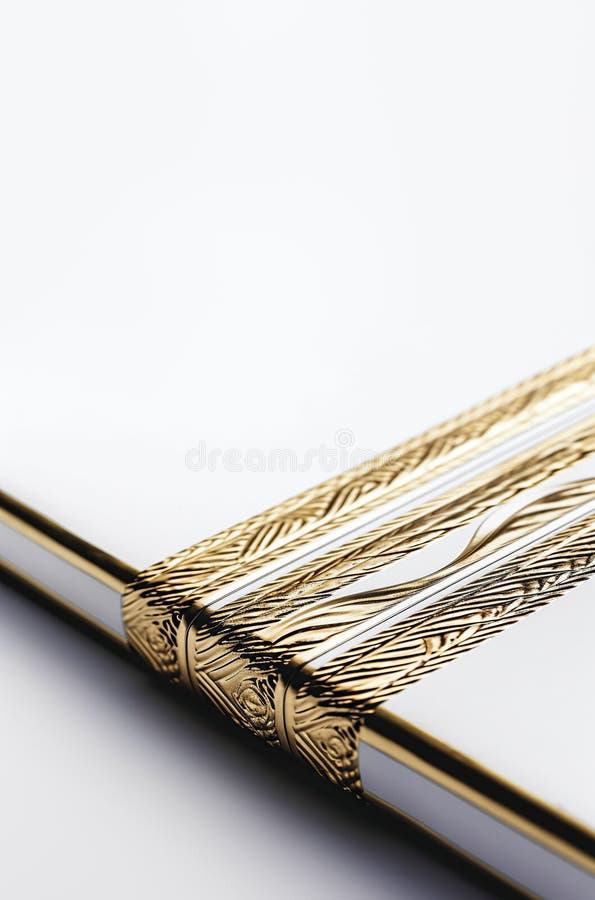 White Book or Notebook Cover with Gold Embossing Background with Copy