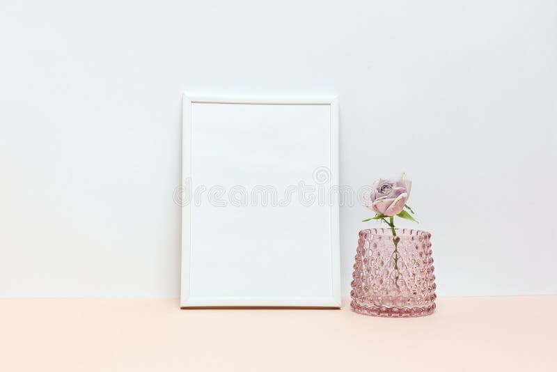 White border and pink roses on the desk