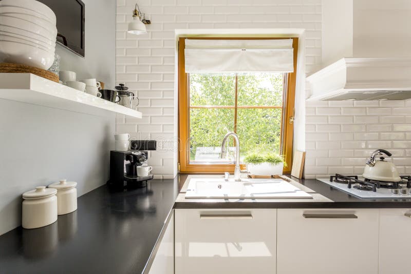 White brick kitchen stock image. Image of indoor, modern 76480791