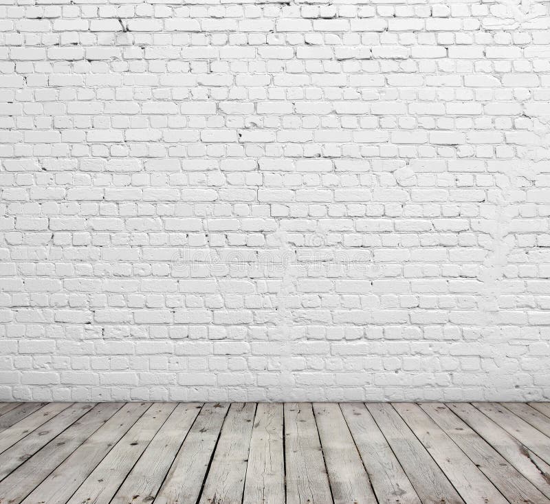 White brick wall and wood floor.