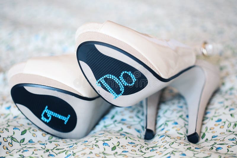 White Bride shoes with I DO text