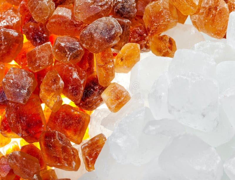 White and Brown Candy Sugar .Stilllife on a White Background Stock
