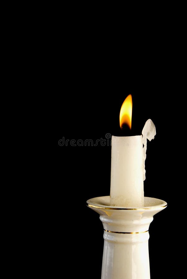 White Burning Candle in Candlestick Stock Image Image of black