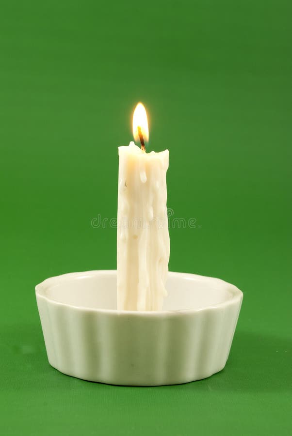 White candle lit stock image. Image of background, white 17638207