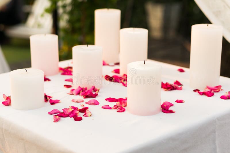 White Candles Surrounded with Pink Rose Petals Stock Photo Image of beautiful, view 68259010