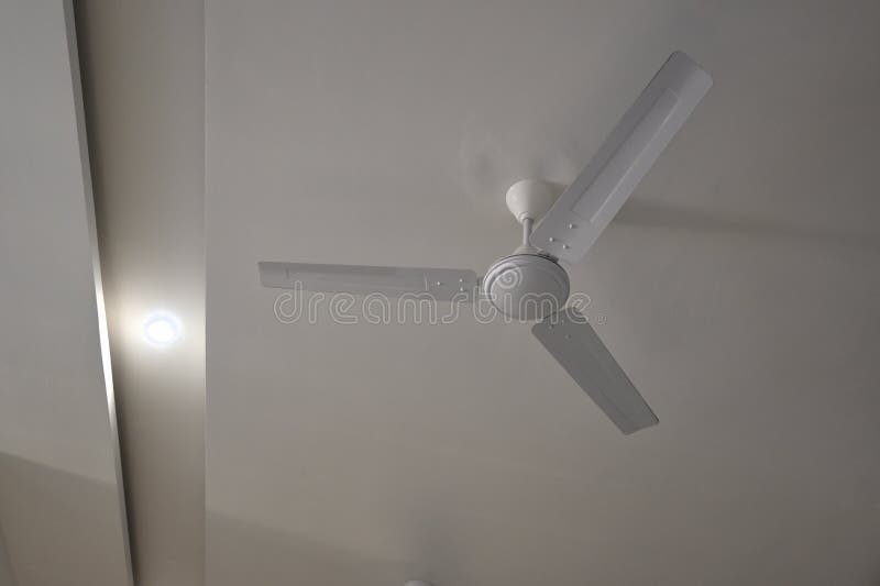 White Ceiling fan in modern room. royalty free stock photo