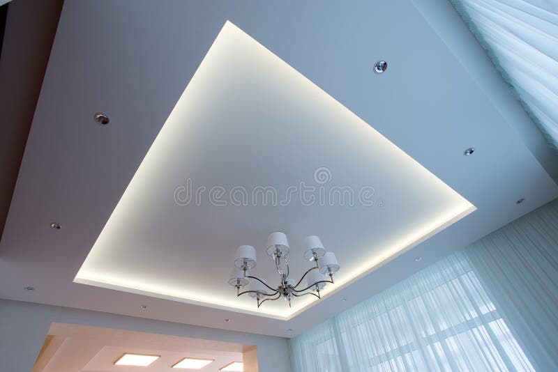 White ceiling illuminated with LED stock photography