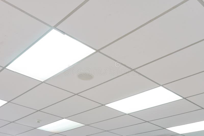 White ceiling with neon light bulbs in uprisen view. as background interior decoration concept with copy space royalty free stock images