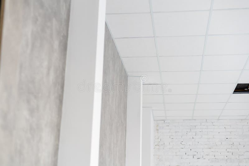 White ceiling in the office. White ceiling can reflect light well. The right light at work. Abstract empty white stock photos