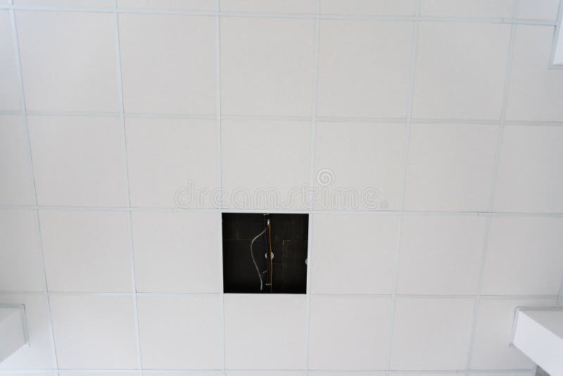 White ceiling in the office. White ceiling can reflect light well. The right light at work. Abstract empty white royalty free stock image