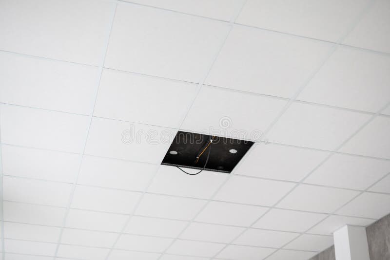 White ceiling in the office. White ceiling can reflect light well. The right light at work. Abstract empty white stock photography