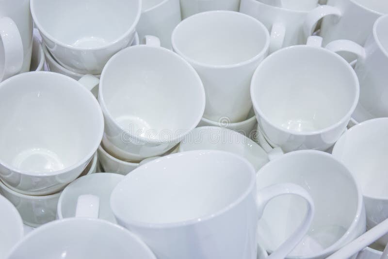 White ceramic cups stock photo. Image of pottery, container 93527444