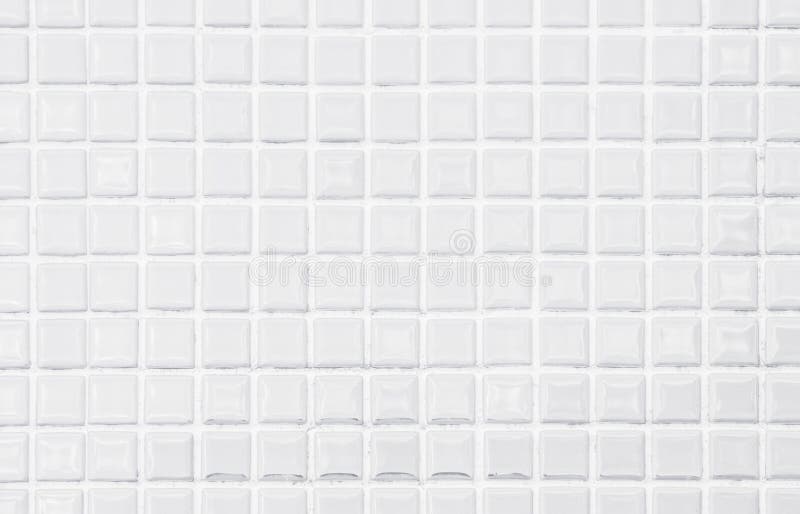 White Ceramic Wall and Floor Tiles Mosaic Background in Bathroom and