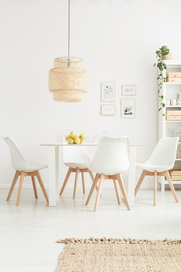 White chairs in bright room