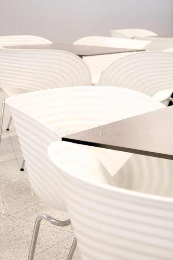 White chairs with tables