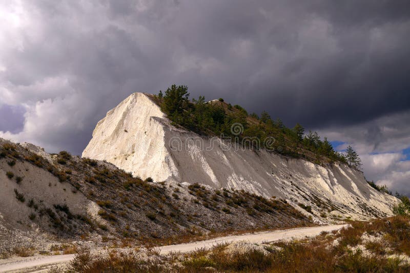 White Chalk Mountain, Quarry Against the Blue Sky Stock Image Image