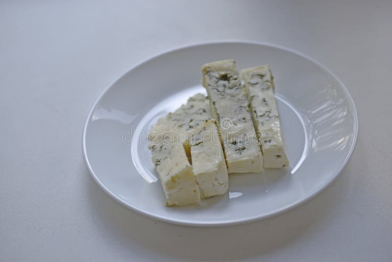 White Cheese with Blue Mold on a White Plate Stock Photo Image of