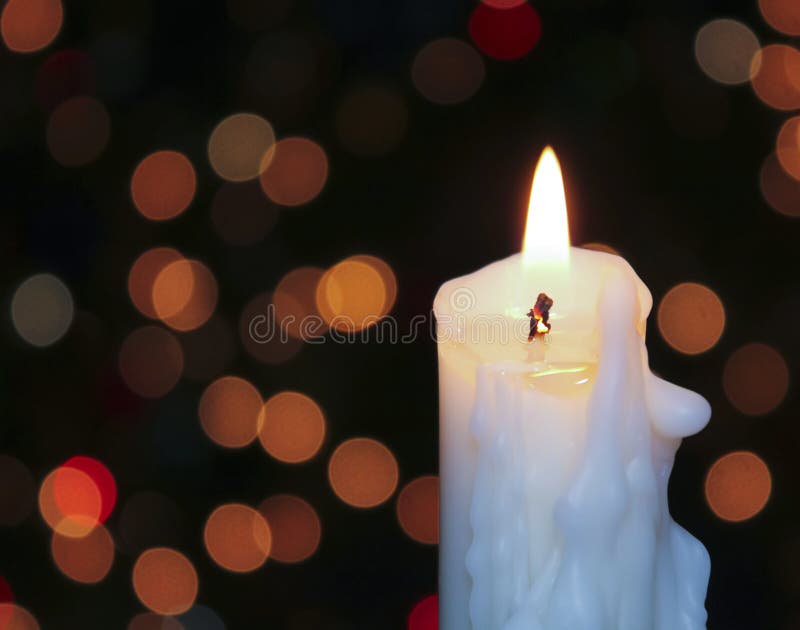 A White Christmas Candle with Blurred Lights Stock Image Image of